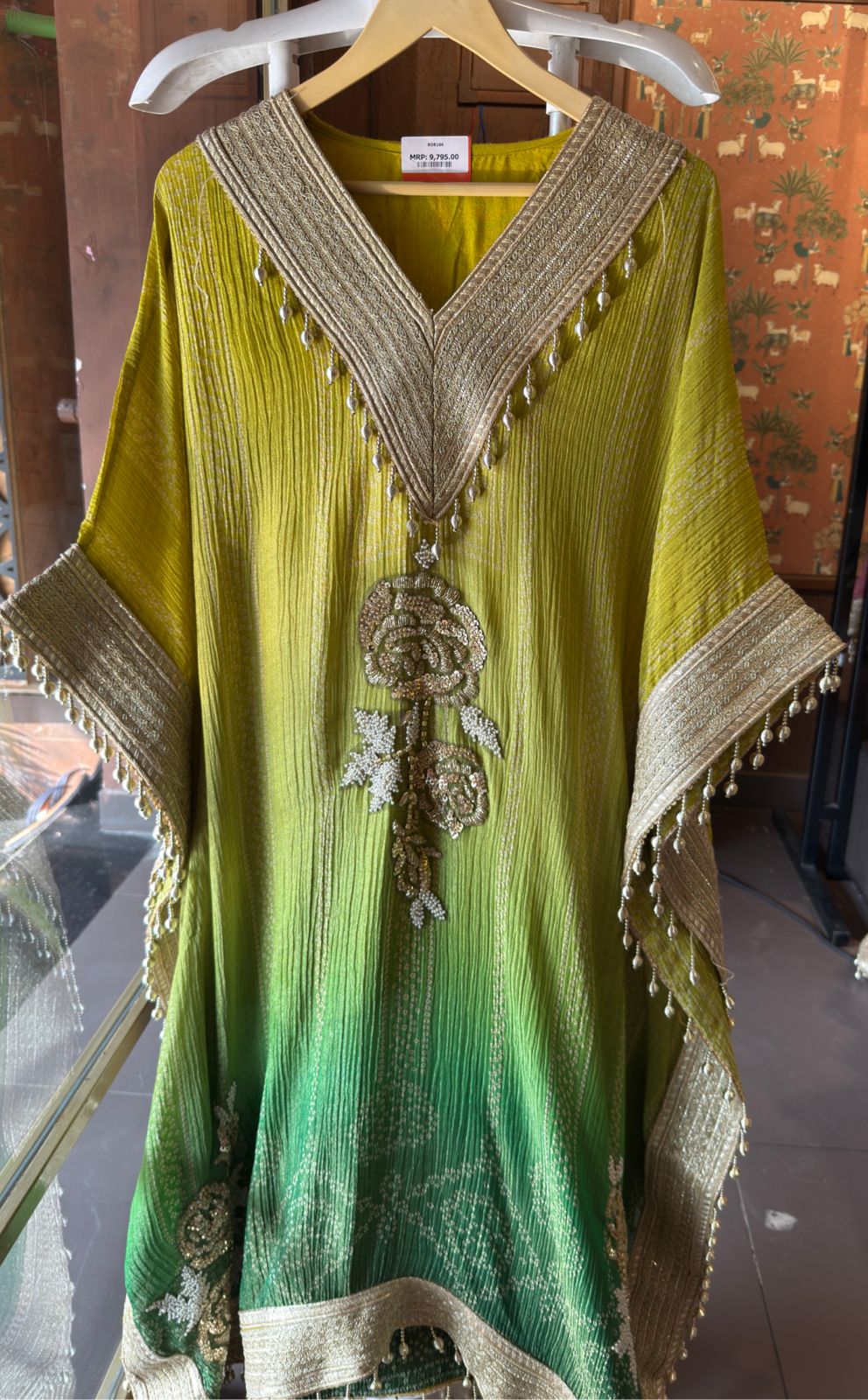 Kaftan dress featuring a vibrant ombré color